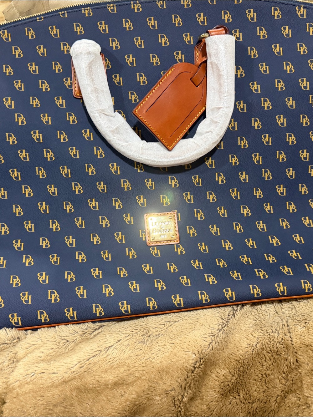 Dooney & Bourke Navy Logo Weekender duffle bag with Tan Leather Accents